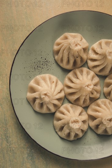 Traditional Georgian dish, Khinkali, Kalakuri, top view, rustic style, no people
