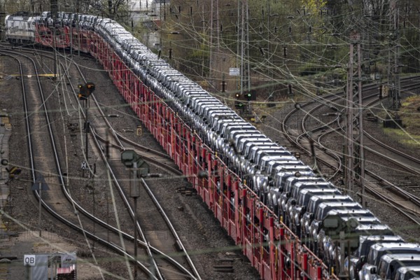 Freight train, car train with Landrover new cars on the goods train line at the Hagen-Vorhalle
