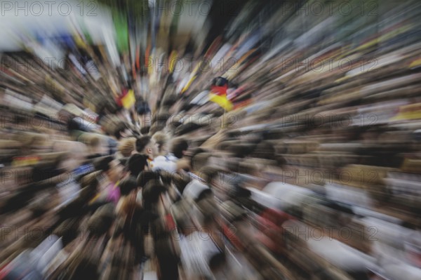 Fans react during the European Championship preliminary round match between Germany and Hungary on
