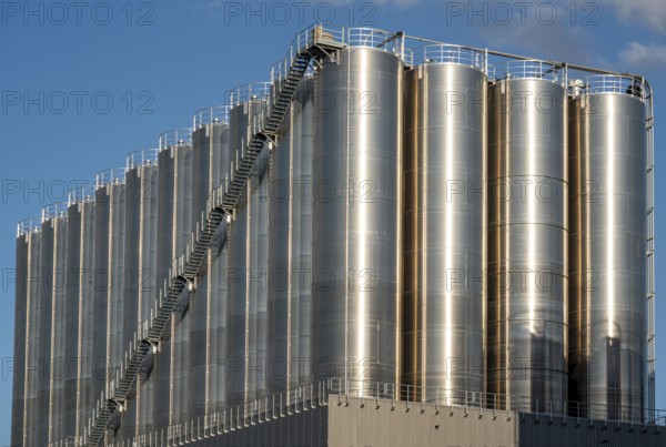 Stainless steel tanks of a large silo facility in Duisburg inland harbour, Duisburg-Neuenkamp, for