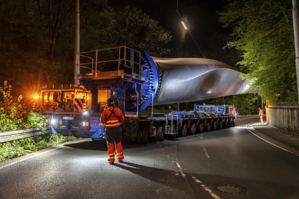 Transport of a 68 metre long, 22 tonne blade of a wind turbine, here in Schwelm, with a
