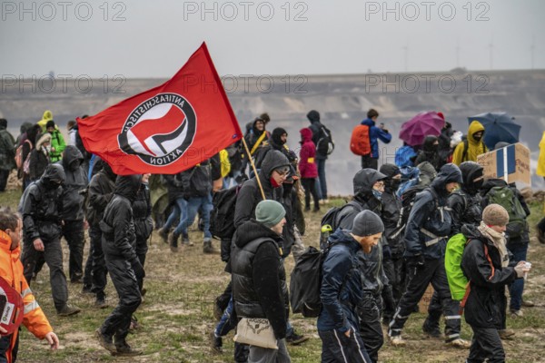 Many thousands of demonstrators march after a demonstration against the demolition of the lignite