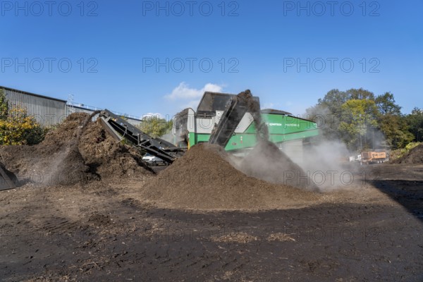 Composting plant, organic waste is composted, sorted by size, smaller parts are reused as compost,