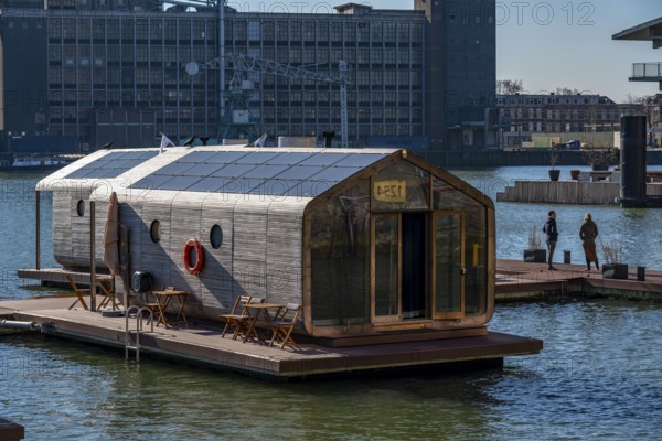 Holiday homes Wikkelboat, at Floating Rotterdam Rijnhaven, floating wooden houses, for rent, at Kop