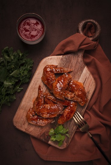 Chicken wings, with barbecue sauce, with tomato sauce, fast food, no people