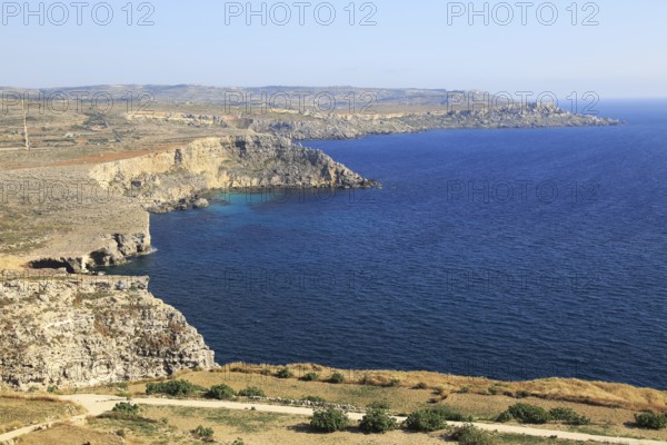 Coastal scenery of cliffs and blue sea looking south from Res il-Qammieh, Marfa Peninsula, Republic