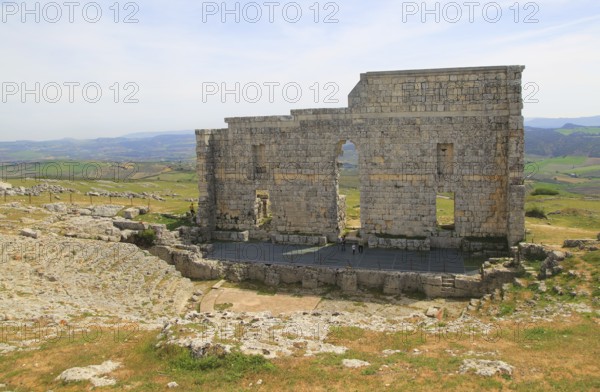 Remains of Roman theatre stage background wall and seating area, Acinipo Roman town site Ronda la