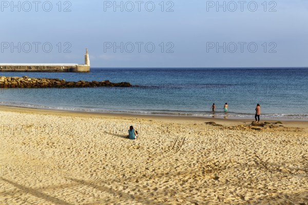 Sandy beach beach, Playa Chica with tourists, Tarifa, Strait of Gibraltar, Costa de la Luz,