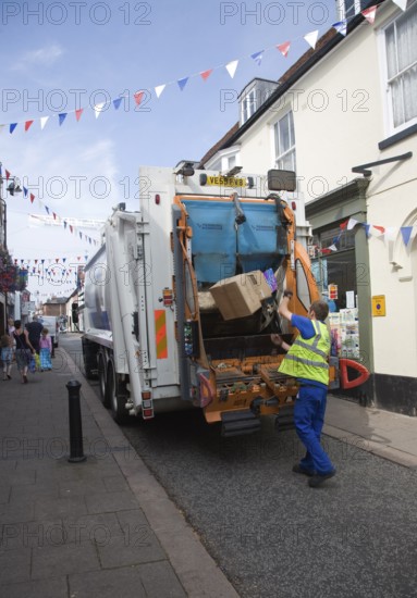 Refuse recycling vehicle in the streets of the town of Woodbridge, Suffolk, England, United