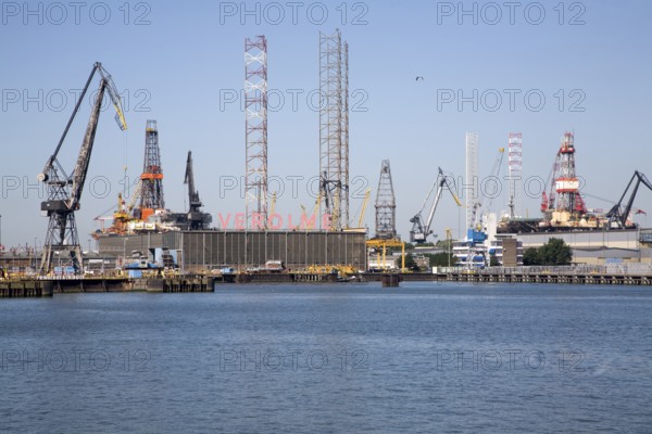 Cranes sign Verolme shipyard Port of Rotterdam, Netherlands
