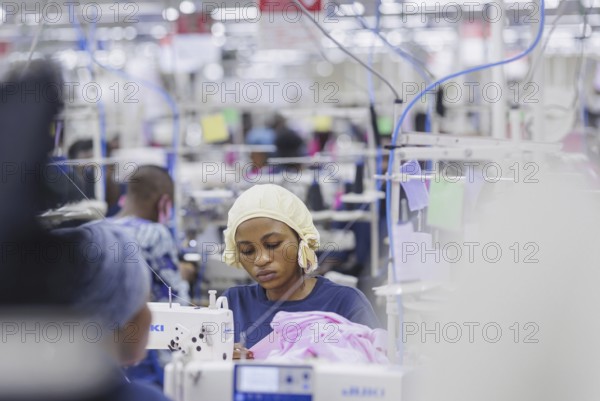 BENIN TEXTILE CORPORATION BENIN, Seamstress in a textile factory in the industrial area near
