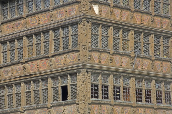 Facade of Maison Kammerzell built in 1427, historic half-timbered house with decorations, wood