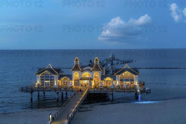 The pier of Sellin, evening mood, sunset, 394 metres long, with restaurant, jetty, island of Rügen,