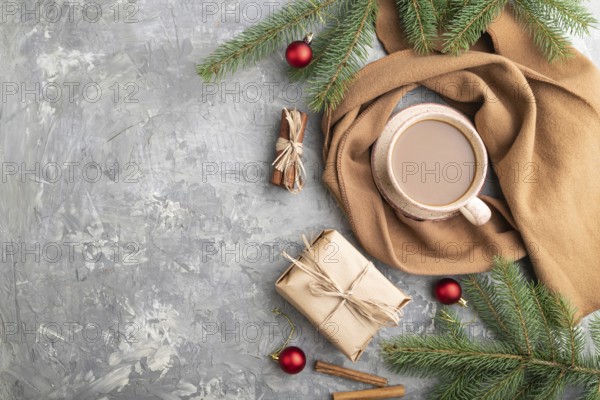 Christmas or New Year composition. Decorations, box, cinnamon, fir and spruce branches, cup of