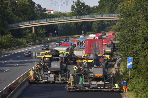 Essen, North Rhine-Westphalia, Germany, Road construction, Asphalt pavers and road rollers lay new,