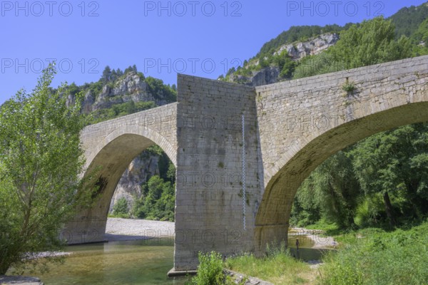 Old stone bridge over the Tarn River in Saint-Enimie, Département Lozère, France, Europe