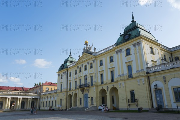 Baroque palace with green domes and blue sky, elegant historical architecture, Branicki Palace,