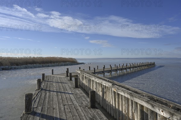 Frozen lake in winter, jetty, Lake Neusiedl, Weiden am See, Burgenland, Austria, Europe