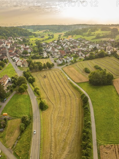 Pretty village nestled in a varied landscape at sunset, Dachtel. Black Forest, Germany, Europe