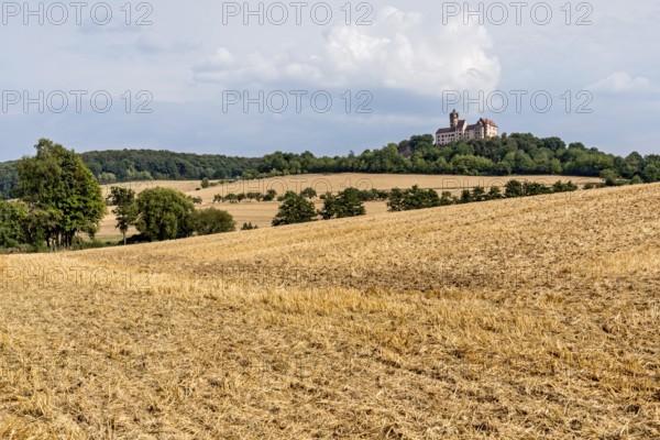 Ronneburg Castle, knight's castle from the Middle Ages, harvested grain fields, field, hill,