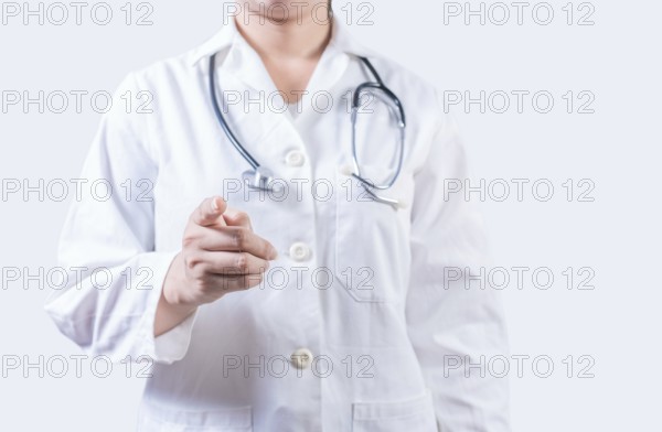 Unrecognizable doctor pointing at the camera. Doctor hands pointing at you isolated, Finger doctor