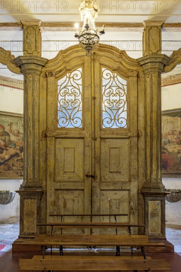 Baroque wooden portal inside a historic church in the city of Ouro Preto in Minas Gerais, Ouro