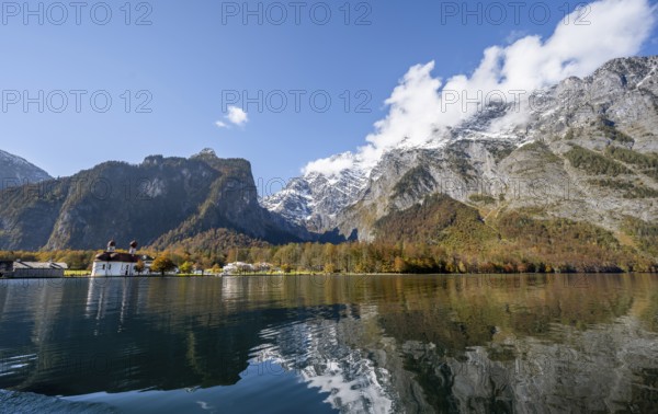Königssee with Watzmann massif and pilgrimage church of St. Bartholomä, autumnal mountain landscape