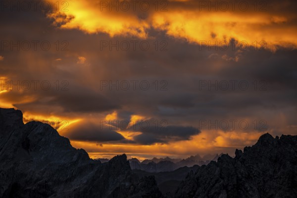 Montafon mountains with dramatic cloudy sky at sunrise, Tschagguns, Rätikon, Montafon, Vorarlberg,