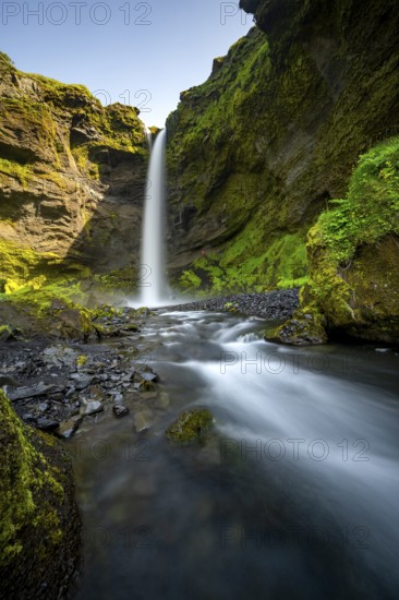 Kvernufoss waterfall, in summer when the weather is fine, gorge and river, long exposure, Skogar,