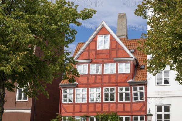Old, red-painted half-timbered house, Christianshavns Kanal, Copenhagen, Denmark, Europe