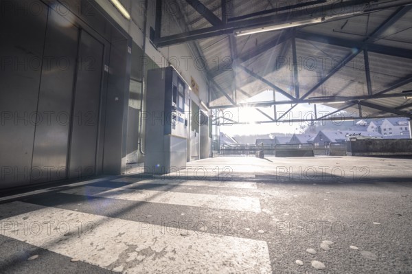 Entrance area with light beams and city view through the steel structure, Kaufland Calw