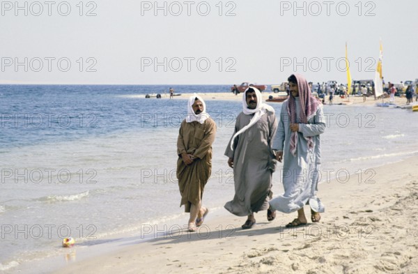 Leisure time, sailing club for foreign workers, Half Moon Bay, Saudi Arabia 1979 three local Saudi