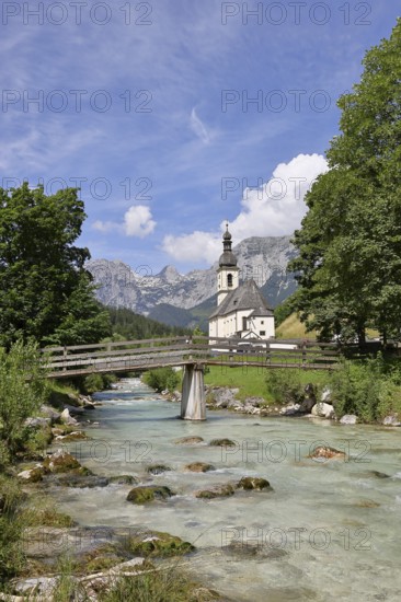 Parish church of St Sebastian with Ramsauer Ache, Reiteralpe in the background, Ramsau,