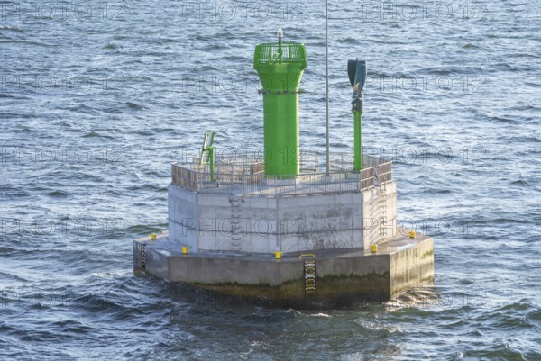 Small lighthouse on navigation mark in Baltic Sea outside Swinoujscie, Poland, Europe