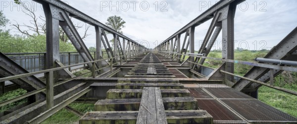 Abandoned railway bridge over the Elbe near Barby, lost place, steel truss bridge from the 1870s on