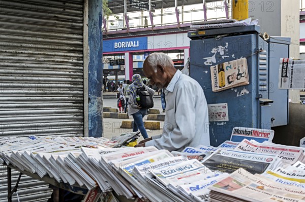 Newspaper vendor at Borivali Railway Station, Mumbai, Maharashtra, India, Asia