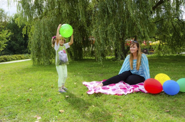 Small girls with aerial balloon