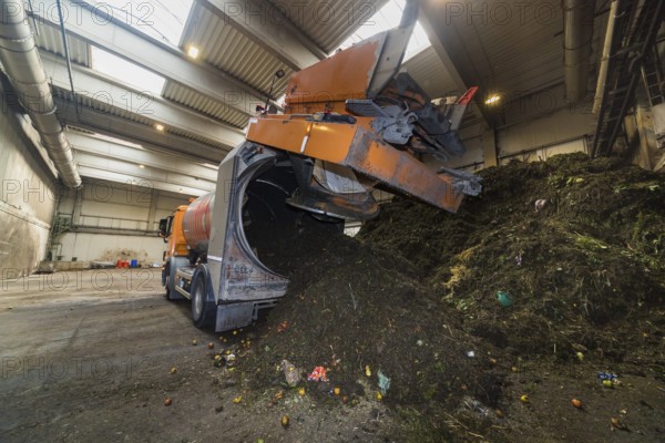 A disposal vehicle from the company Becker Umwelttechnik, delivers the contents of organic waste