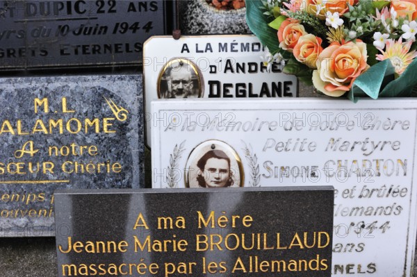 Graves of the murdered inhabitants in the cemetery. The burnt village of Oradour-sur-Glane was
