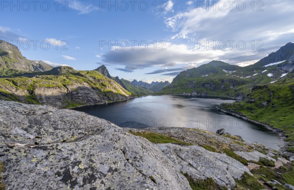 Mountain landscape with lake Tennesvatnet, at sunrise, Moskenesøya, Lofoten, Nordland, Norway,