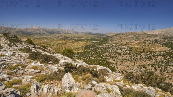 Lassithi plateau, rocks, Machia, view down to the plain, cloudless blue sky, mountains, Lassithi,