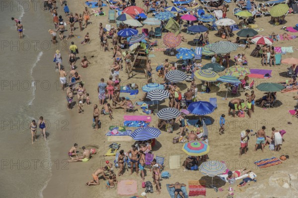 Tourists at the Playa Mal Pas, Benidorm, Province of Alicante, Costa Blanca, Spain, Europe
