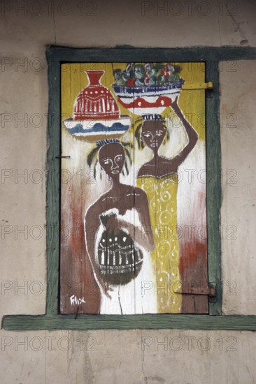 Painted and decorated window shutters of house, Klouto, Togo, West Africa, Africa