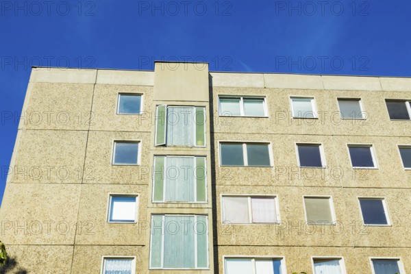 Typical GDR prefabricated slab building of the type WBS 70 in original condition at the rear of the