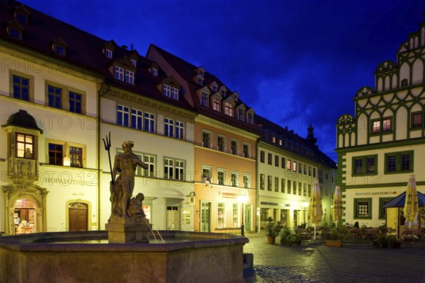 The square was given its distinctive shape in the 16th century by the town house and the