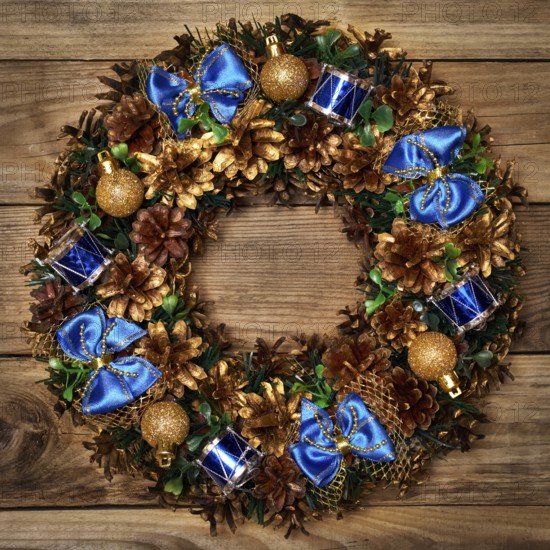 Christmas wreath on wooden background
