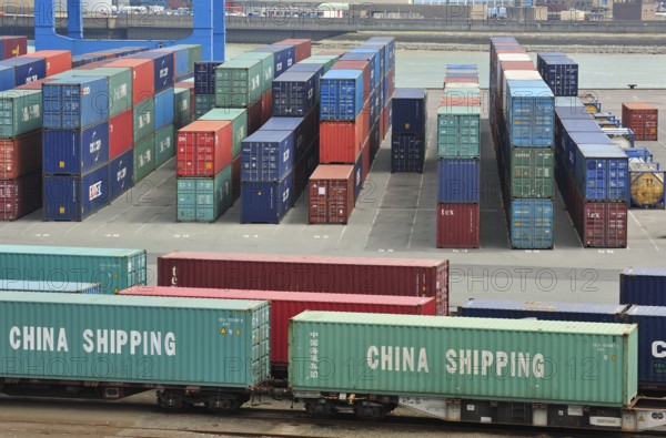 Stacked containers in the container terminal in the port of Zeebrugge, Belgium, Europe