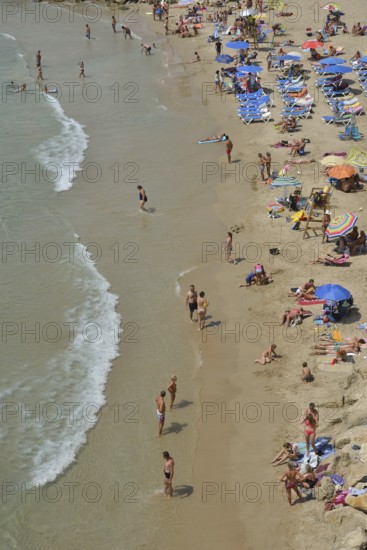 Bathers on Playa Poniente, Benidorm, Costa Blanca, Spain beach