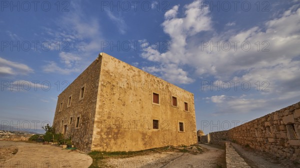 Fortezza, Venetian sea fortress, super wide angle shot, building, fortress wall, blue sky, few