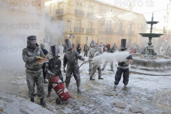 Els Enfarinats flour fight, rebels, armed with flour, eggs and firecrackers, take over the regiment
